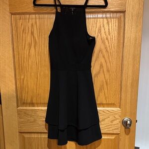 Trixxi Black Sleeveless Mini Dress with Open back and lace detail